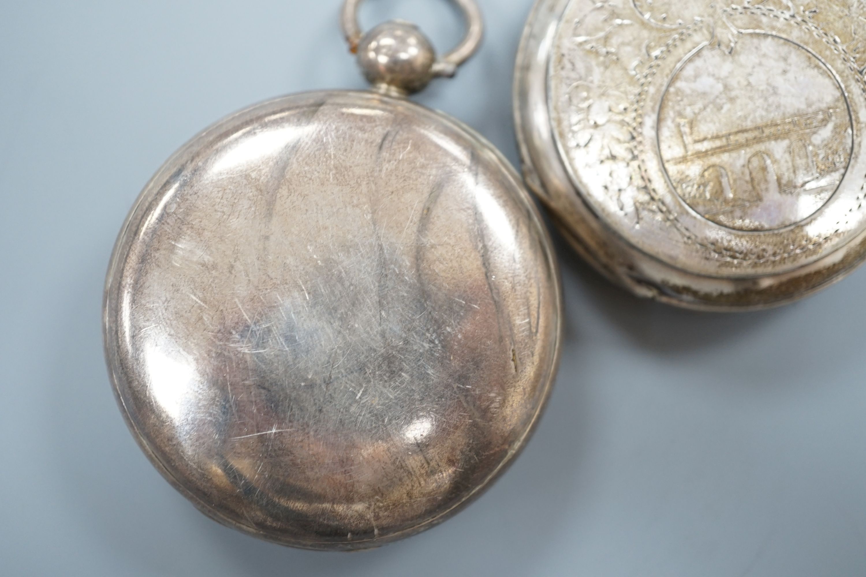 A 19th century white metal hunter pocket watch, by Robert Roskell, Liverpool, engraved with train on a bridge and one other silver hunter pocket watch.